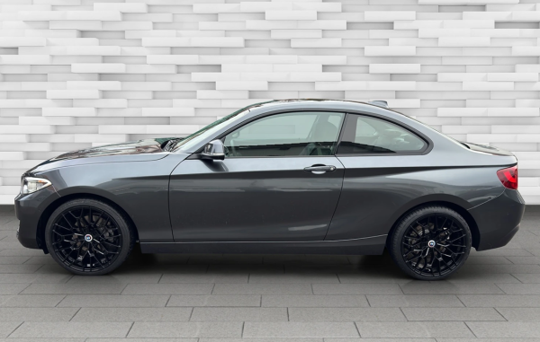 C) BMW 220i